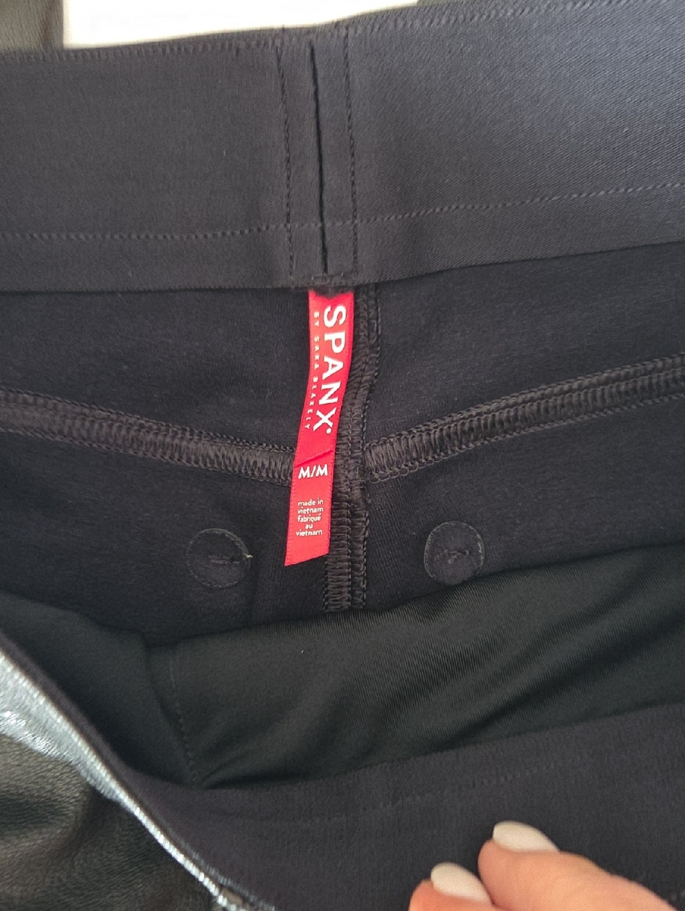 SPANX Black Shaping Leggings with Red Brand Tag- faux leather in black.